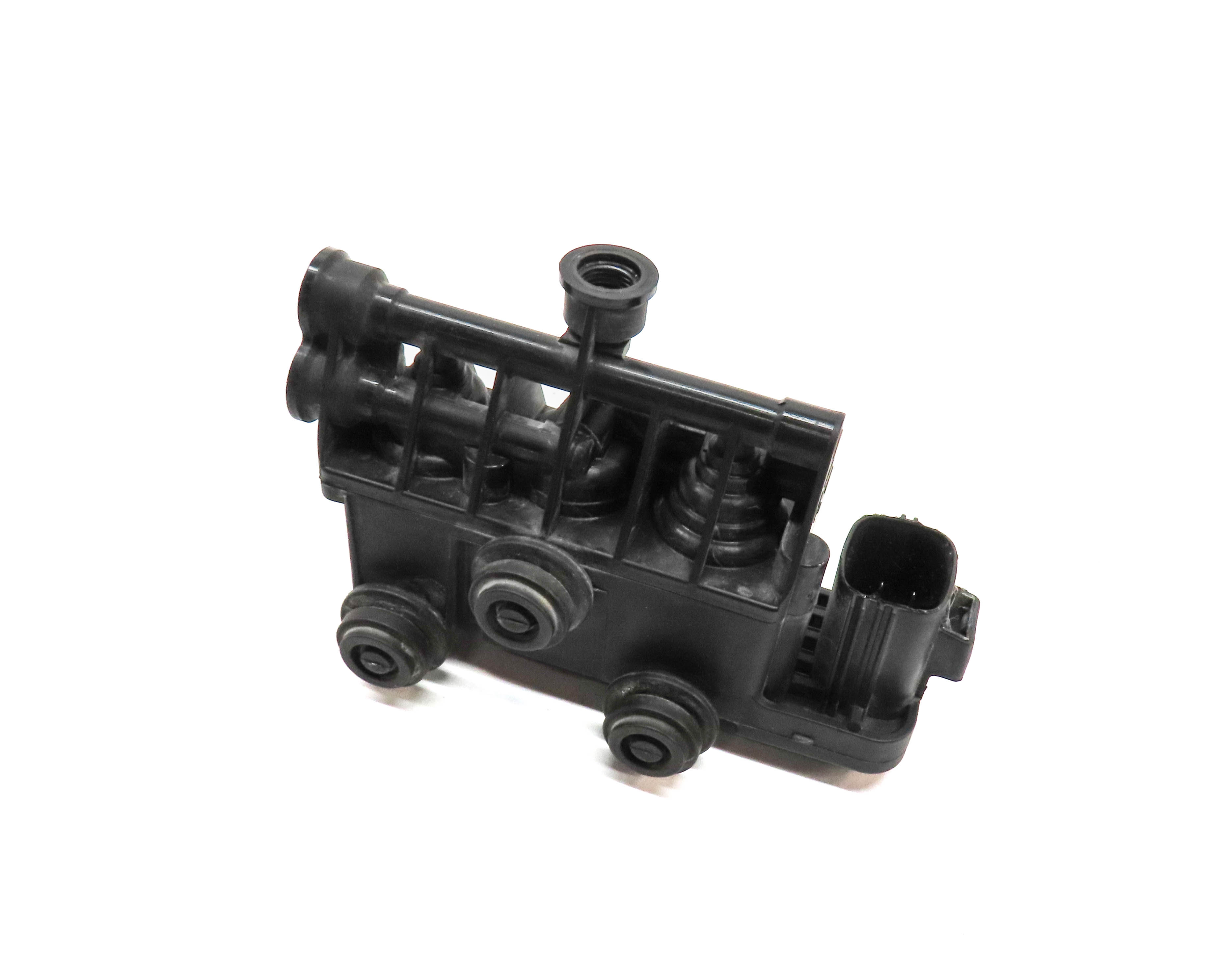 2010 RANGE ROVER (L322) FRONT AIR SUSPENSION TRANSFER RELIEF VALVE BLOCK — exact item pictured